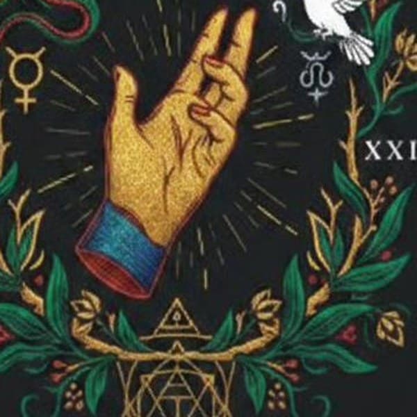 Gilt hand emblem — detail